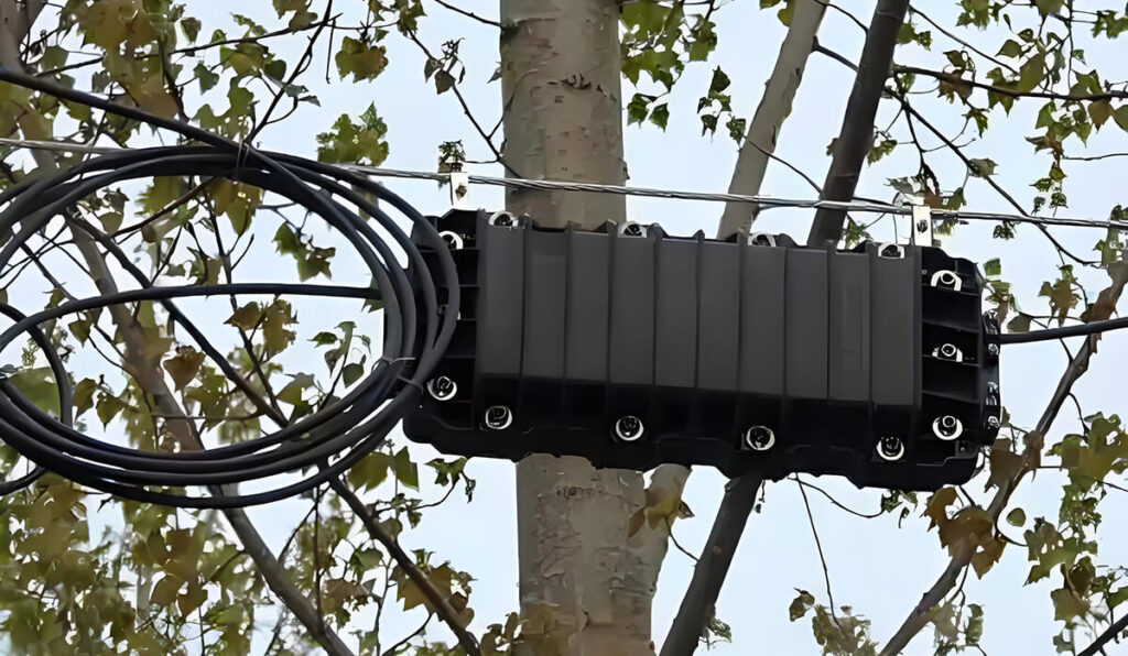 Aerial installation of fiber splice closure in real-world application