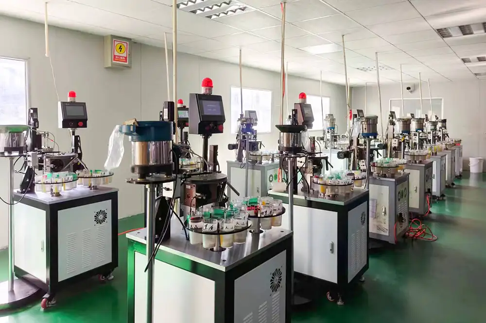 Automated ferrule assembly workshop for high-precision fiber optic components